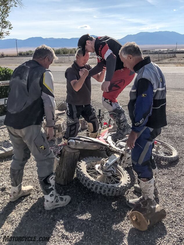 the infamous nevada itinerary, It hurt me to have to do this more than it hurt the bike What you can t see is that although I am stomping on the motorcycle I put a folded up belt under the left grip so it wouldn t get damaged