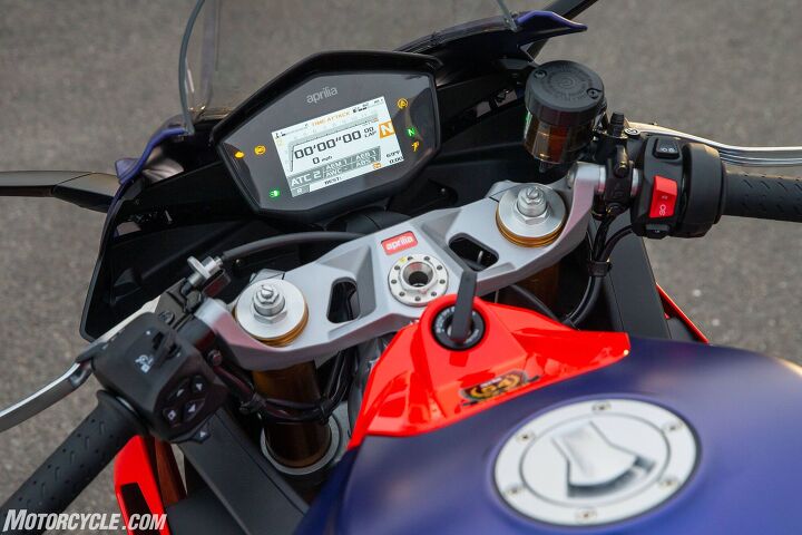 2021 aprilia rs660 review first ride, The TFT display is the centerpiece of the cockpit but look a little lower and you ll notice the bars extending above the triple clamp for added comfort If you look closely you can see the mount for the bar is cast as part of the triple clamp design