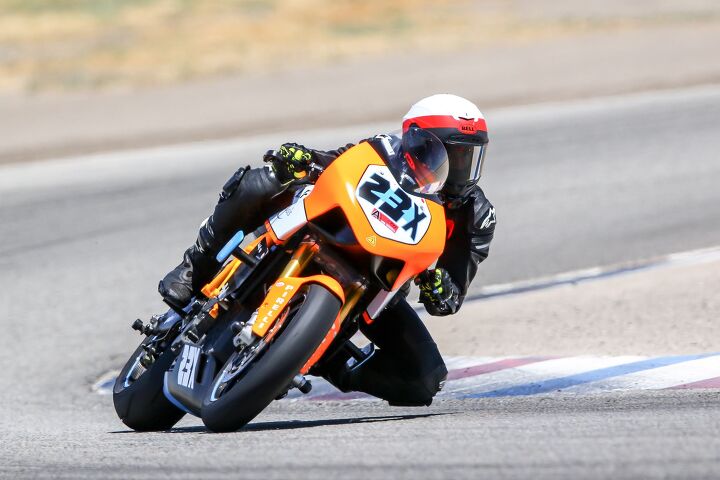 the lightfighter electric superbike is back and better than ever, It didn t take long during the very first test of the Lightfighter v2 0 to realize it was a clear step forward from before Also the bright orange color means you ll never lose sight of it on track Photo Caliphotography