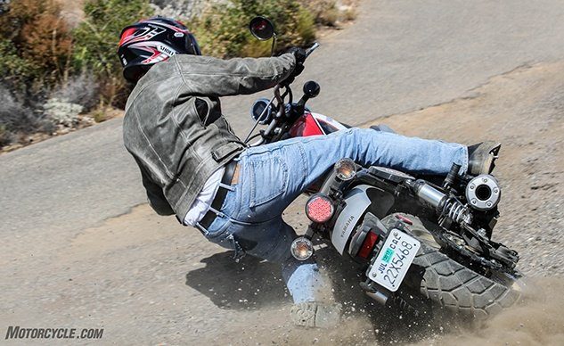 motorcycle first aid what you need to know, The truth is we are trained professionals some classically and some by the school of hard knocks Really who else but the Evans in Charge could make sliding through the gravel look this good
