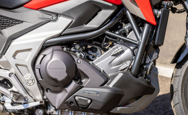 2021 honda nc750x review, The laydown cylinder bank and underseat gas tank keep the weight low which makes the bike feel light The 745 cc Twin is happy with 86 octane and not much of it