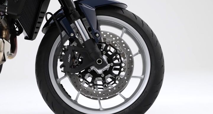 honda hawk 11 revealed but many questions remain, The Hawk 11 runs on 17 inch wheels front and rear A close look at the tires reveal they are Dunlop Sportmax GPR 300s