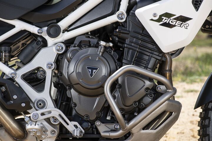 2023 triumph tiger 1200 review first ride, Despite cranking out more power the new Tiger 1200 engine is actually 55 cc smaller at 1160 cc The compression ratio however has increased from 11 0 1 to 13 2 1