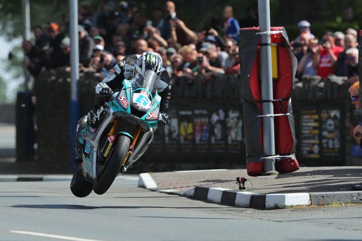 out and about at the isle of man tt 2022 part 2, Michael Dunlop at St Ninnian s Crossroads top of Bray Hill 150 MPH two wheels up Photo by Dave Kneen Pacemaker Press