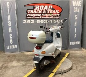only 5447 miles tall windshield rear storage box and new tires cool 4 stroke