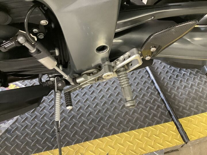 akrapovic exhaust adjustable rear sets rack heated grips abs esa shift