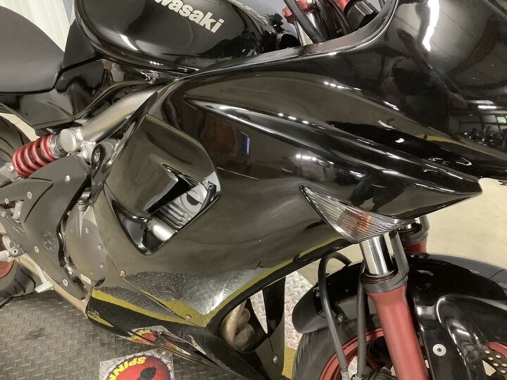 stock fuel injected sport bike has left side tank dent and scratches we