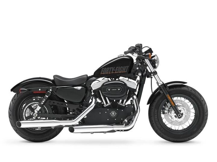 2013 harley davidson with a fat front tire and steel peanut tank this