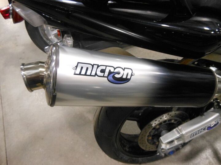 micron exhaust slip on with saddleman seat for rider comfort 1000cc of sport bike
