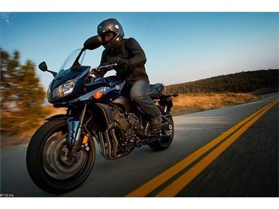 from twisties to touring think of the fz1 as an upright r1 ready to