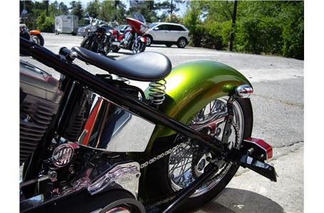 this is one sweet bobber from sucker punch sally with a springer front end