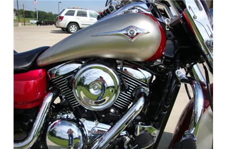triple headlights vance and hines mufflers and a luggage rack are the obvious