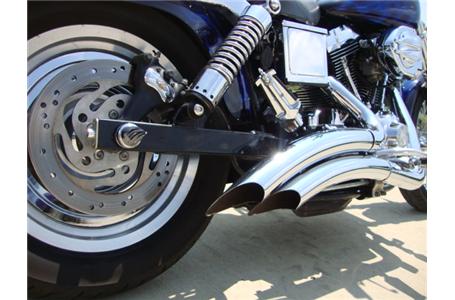 this dyna low rider custom has been heavily modified with a truckload of chrome