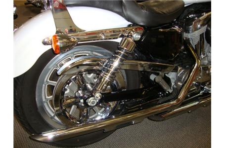 this pretty little pearl white sportster low is an attention getter it has a