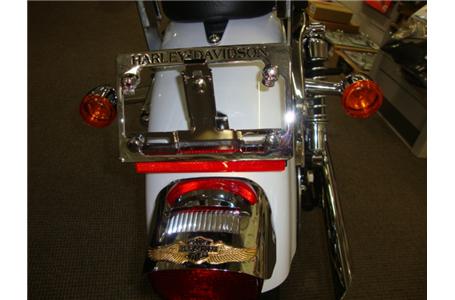this pretty little pearl white sportster low is an attention getter it has a