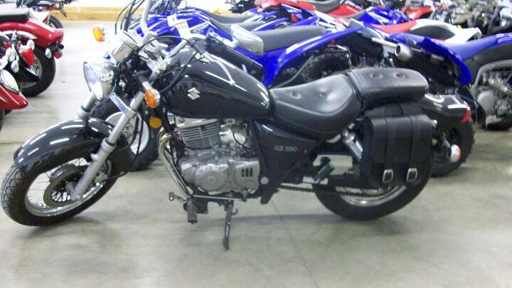 2005 suzuki gz250 saddle bags low miles 70 mpg call 989 224 8874 today it