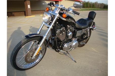 100th anniversary sportster in really nice shape with some chrome pieces that have