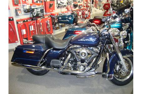 less can truly be more with the flhrs road king custom as it rides with an