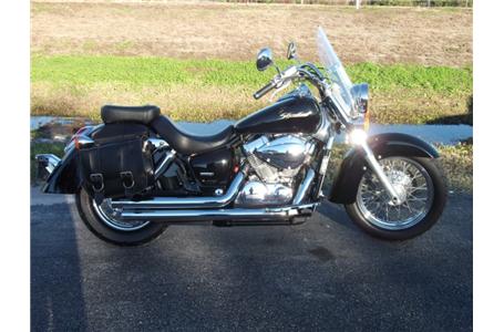 windshield saddle bags cobra exhaust and floor boards chrome neck covers jet