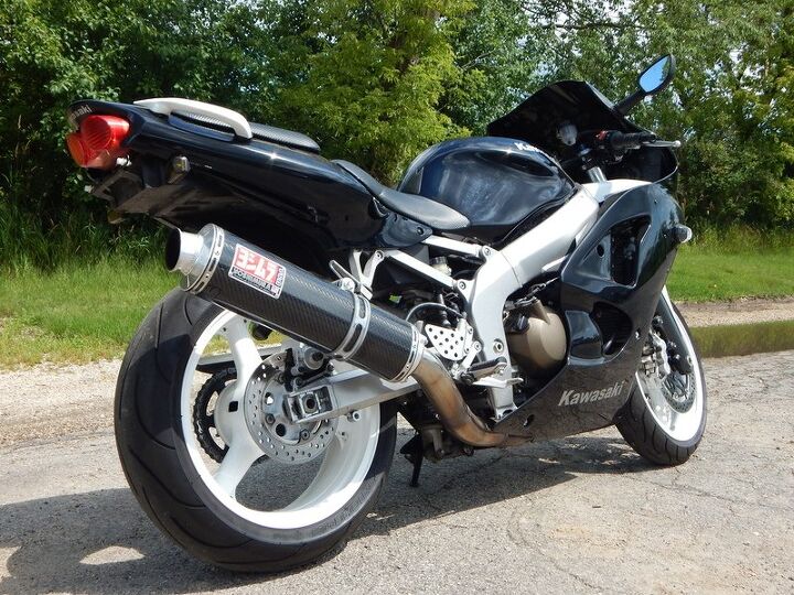 custom white wheels and other accents yoshimura exhaust cool look we can