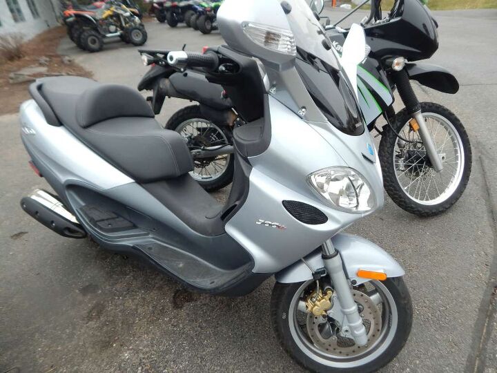 1 owner stock scooter www roadtrackandtrail com we can ship this for 399
