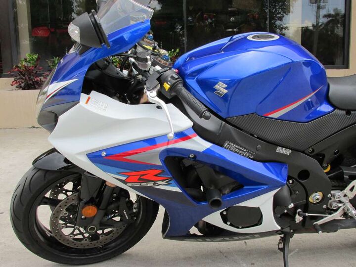 this is one clean gixxer looks practically brand new low miles fast