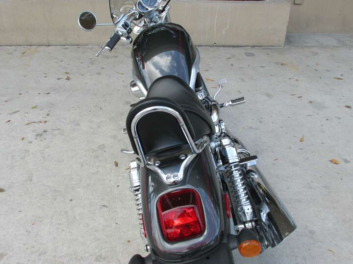 this v rod is sit on beautiful chrome wheels with chrome forks why buy new