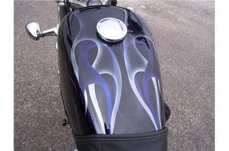 this bikes in good shape low mileage nice custom flame paint job its been