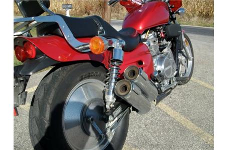 what a cool bike v four engine four pipes and solid rear rim runs great comes