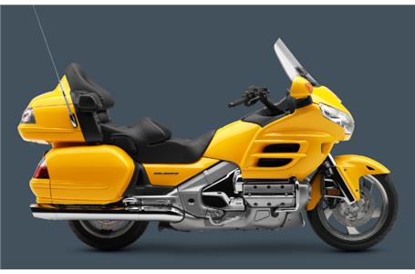 brand new yellow goldwing this unit has the honda upper trunk spoiler installed