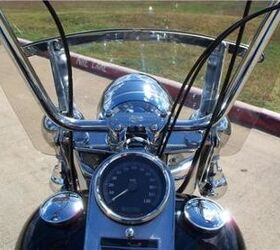 the smooth riding enjoyment of custom touring aboard the heritage softail classic