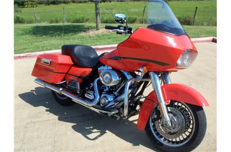 identified by its shark nose frame mounted fairing the road glide gobbles up the