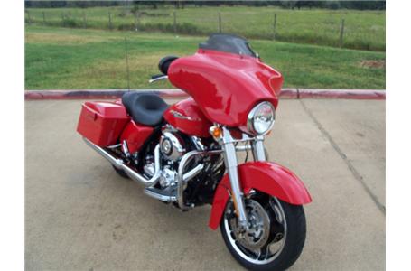 the redesigned street glide is a bagger with hot rod soul with minimal trim and