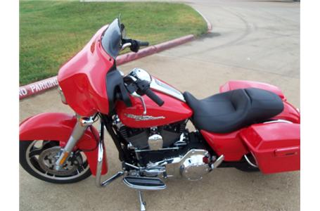 the redesigned street glide is a bagger with hot rod soul with minimal trim and