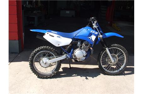 125cc 4 stroke normal scuffs and scrapes tires excellent