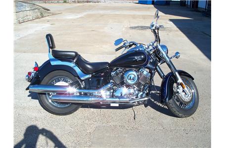 very clean bike well maintained nice dark blue paint classic wire wheels and