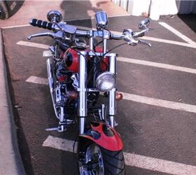 https://cdn-fastly.motorcycle.com/media/2023/03/08/10399627/new-never-sold-custom-ozbike-mini-chopper-150cc-6999-00-obo.jpg?size=720x845&nocrop=1