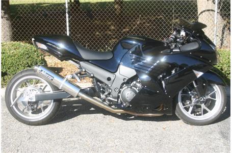 this zx 14 is in like new condition it has a muzzy exhaust 12 extended