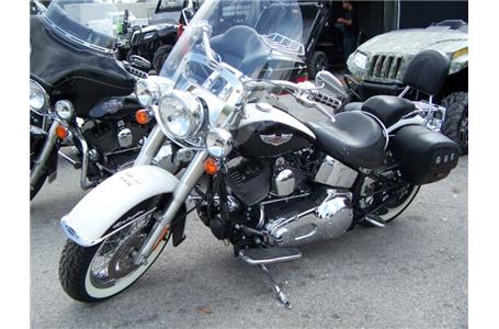 outstanding deal this 05 softail deluxe is a beauty low mileage lots of