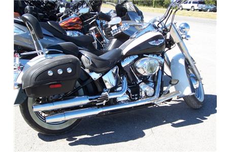 outstanding deal this 05 softail deluxe is a beauty low mileage lots of