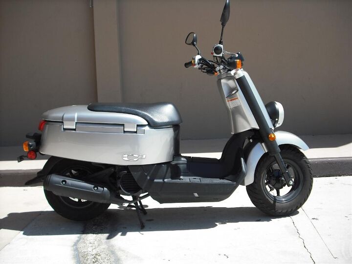 small scooter with tons of storage fuel efficiency doesn t get any better