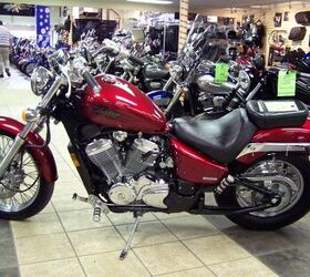 like its vlx sibling the vlx deluxe features the hardtail look rear