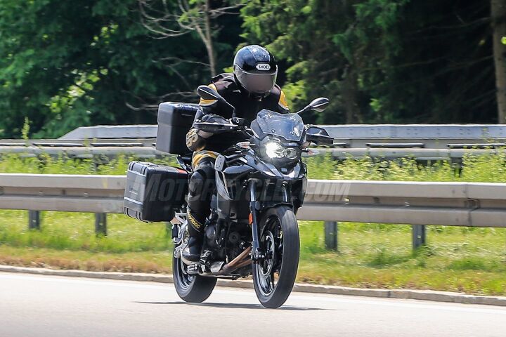 2018 bmw f900gs and f750 spy shots, The bike in this photo has cast aluminum wheels and a conventional fork which makes us think this could be a base model of the new bike decontented somewhat to make for a more palatable MSRP and with less off road intentions and a lower seat height It also might use different nomenclature from the F900 like the existing F700 F800 which has us guessing F750GS