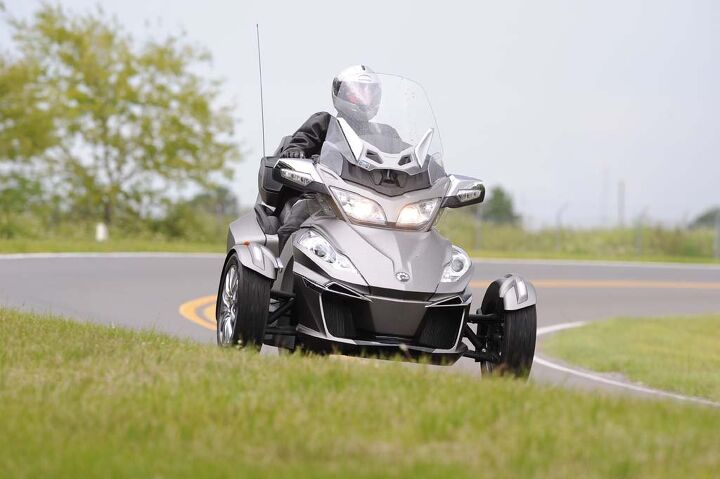 2014 can am spyder review, Spyders can be ridden in a spirited fashion but push the envelope too far and Can Am s Vehicle Stabilization System activates cutting power to help keep all three wheels firmly planted on the road