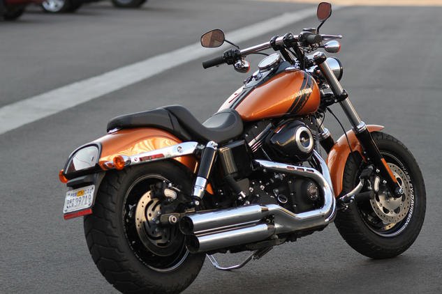 2014 harley davidson fxdf fat bob review, The new mufflers growl distinctively displaying the trademark Harley virility the recently reviewed touring models seemed to lack in the Denver elevation