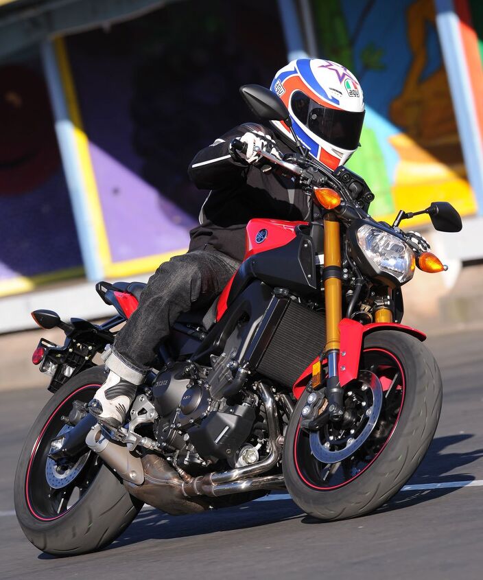 2014 yamaha fz 09 review, For the money it s hard to think of a motorcycle as capable and entertaining as the FZ 09 We can t wait to stack it up against its three cylinder rivals