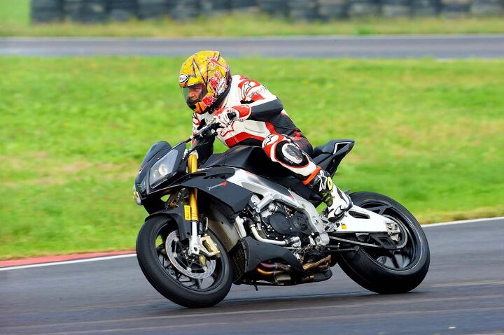 2014 aprilia tuono v4r abs launch, Tall bars better seat advanced electronics ABS and a more user friendly engine The 2014 Aprilia Tuono V4R ABS clearly won over Sagen We re looking forward to getting one Stateside to see if it will have the same effect on us