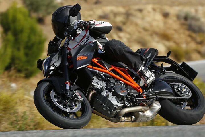 church of mo 2014 ktm super duke r review, Oh the places you ll go Accessorized with some soft luggage from KTM s Powerparts selection and the Super Duke R morphs into high performance mileage gobbler Yeah it s seriously that comfortable