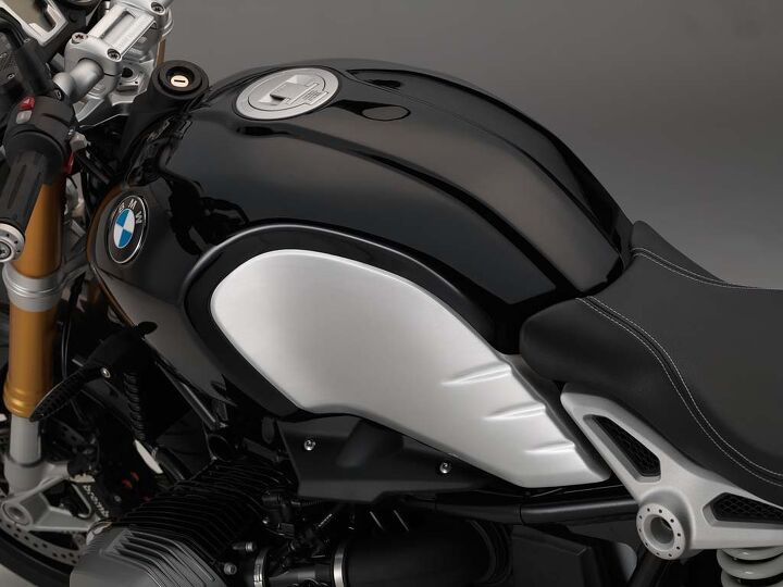 2014 bmw r ninet unveiling, BMW motorcycles have worn classic black often during the company s 90 years of production The silky metallic black paint creates an ideal contrast to the clear coated brushed aluminum of the tank