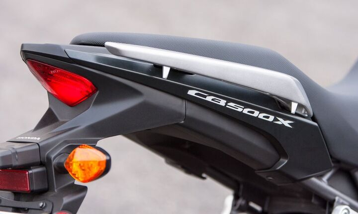 2013 honda cb500x review, Passenger ergos include grab handles and comfortably placed footpegs